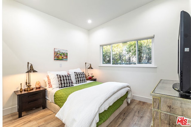 bedroom featuring light hardwood / wood-style floors