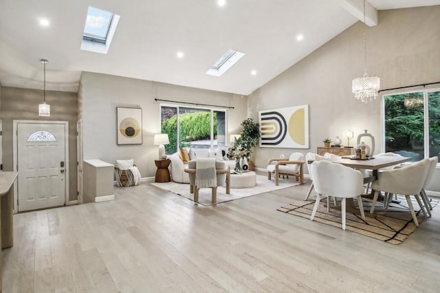 living room featuring high vaulted ceiling, beam ceiling, and light hardwood / wood-style flooring