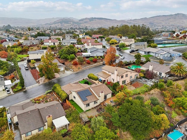 drone / aerial view featuring a mountain view