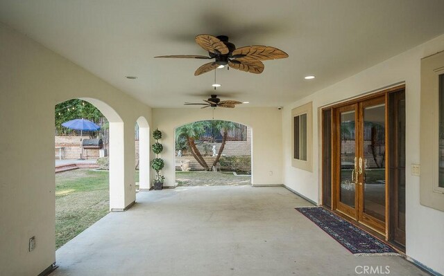 view of patio / terrace with ceiling fan and french doors