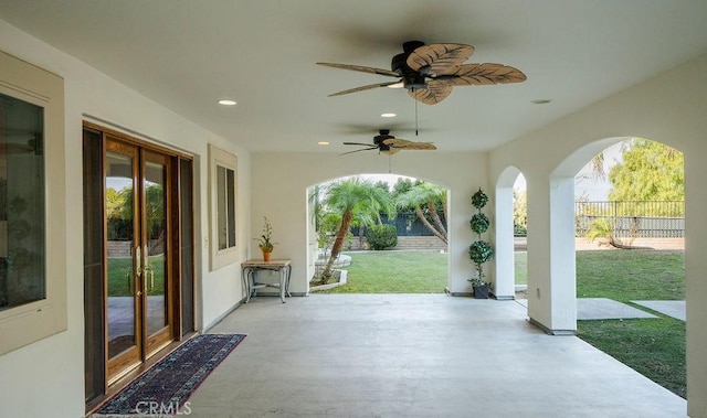 view of patio featuring ceiling fan and french doors