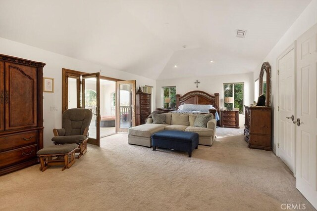 carpeted bedroom with access to exterior, multiple windows, and lofted ceiling