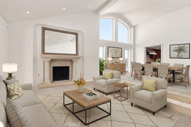 living room with light carpet and high vaulted ceiling