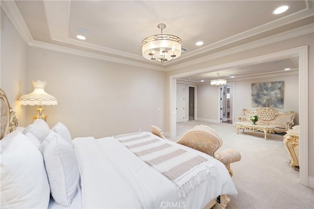 carpeted bedroom featuring an inviting chandelier, ornamental molding, and a tray ceiling