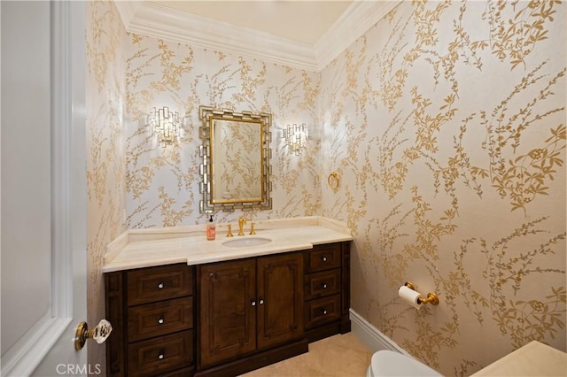 bathroom featuring toilet, crown molding, and vanity