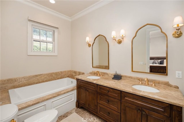 bathroom featuring toilet, vanity, a washtub, and ornamental molding