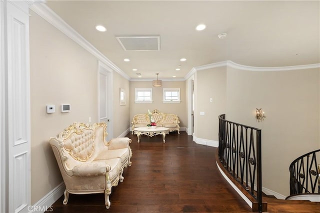 living area featuring dark wood-type flooring and crown molding