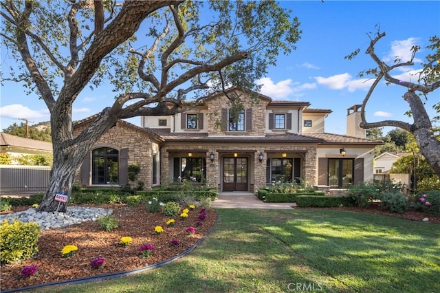 view of front of home featuring a front lawn