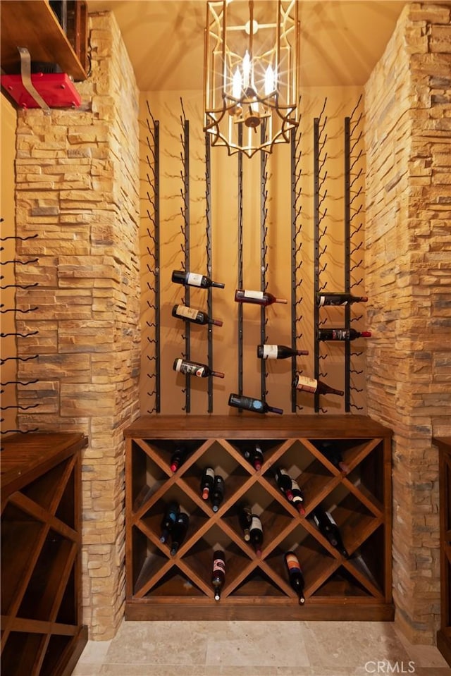 wine room with a notable chandelier