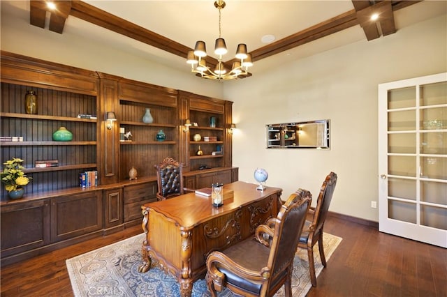 office area featuring dark hardwood / wood-style flooring, beamed ceiling, and an inviting chandelier