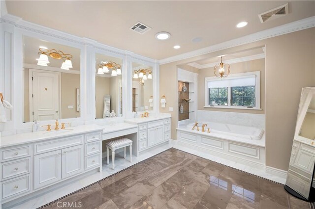 bathroom with vanity, built in features, a washtub, and ornamental molding