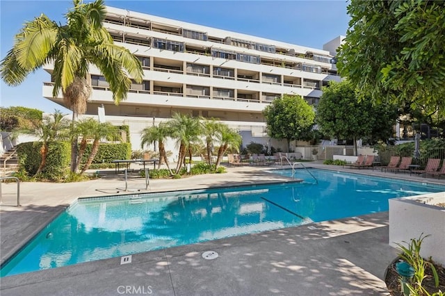 pool with a patio area