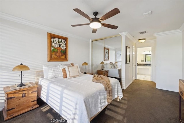 bedroom with crown molding, dark colored carpet, visible vents, ceiling fan, and baseboards