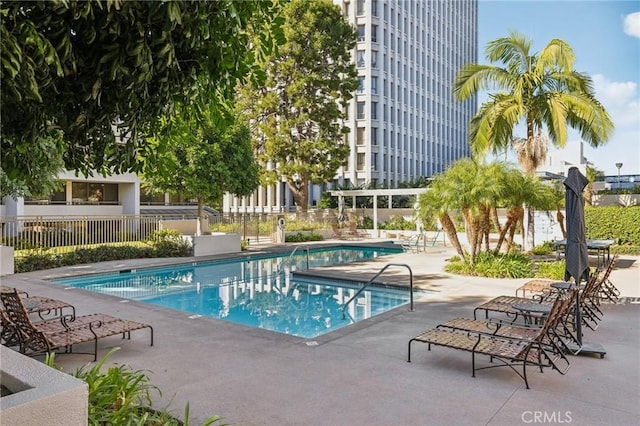 view of swimming pool featuring a patio