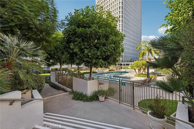 exterior space featuring a patio area and fence