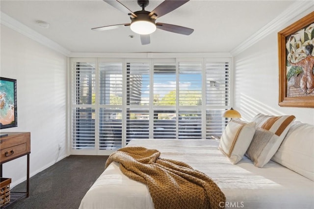 bedroom featuring ceiling fan, access to outside, dark carpet, and crown molding