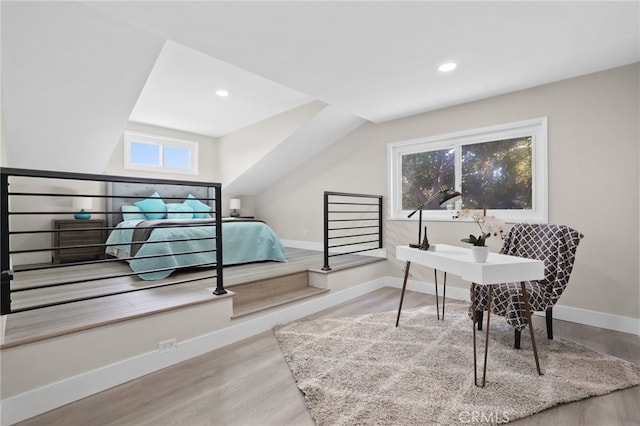 bedroom with hardwood / wood-style floors