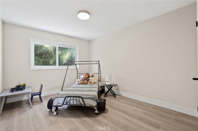 bedroom featuring light hardwood / wood-style flooring