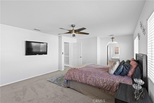 carpeted bedroom featuring ceiling fan