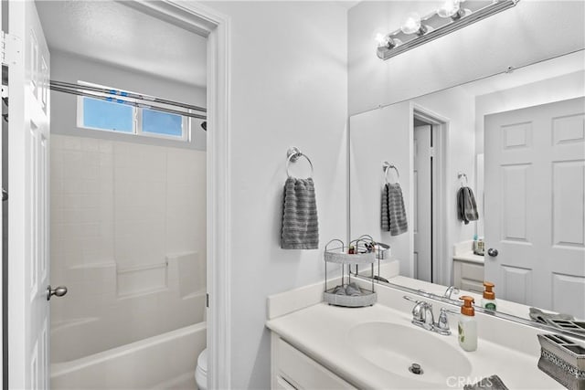 full bathroom with vanity, toilet, and tub / shower combination