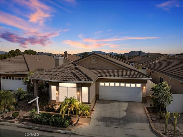 view of front of property featuring a garage