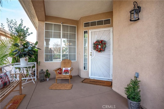 property entrance featuring covered porch