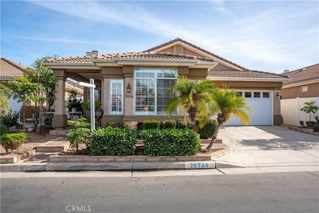 view of front of home with a garage