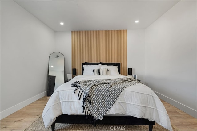 bedroom featuring light hardwood / wood-style floors