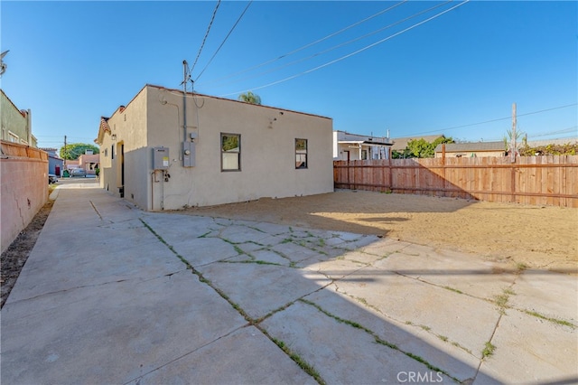 rear view of house with a patio