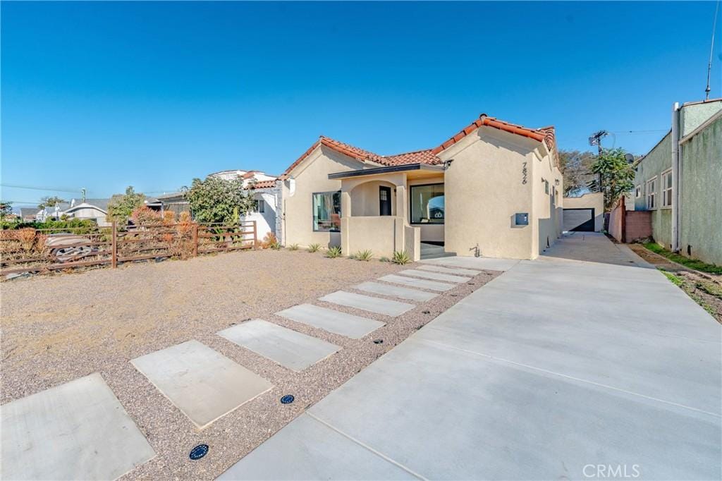 view of front of house with a patio area