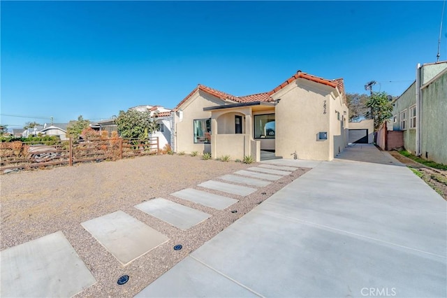 view of front of house with a patio area