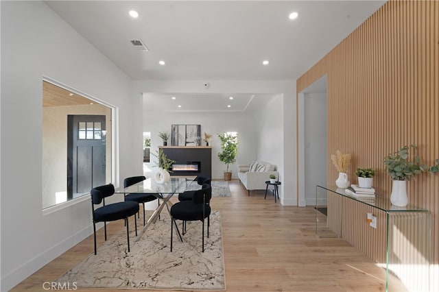 dining area with light wood-type flooring