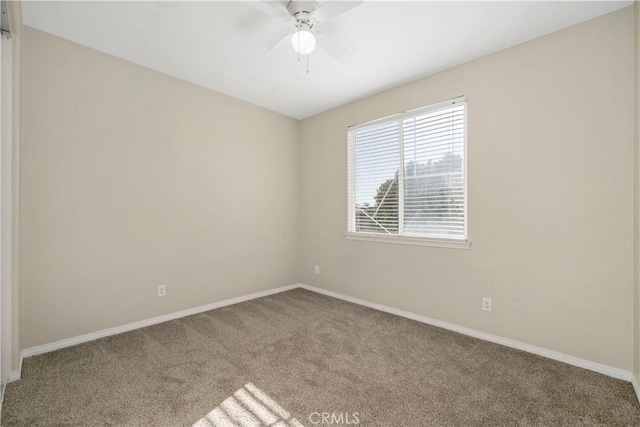 carpeted empty room with ceiling fan