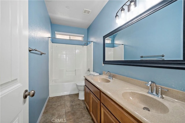 full bathroom with washtub / shower combination, toilet, and vanity