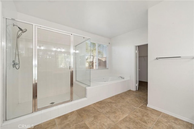 bathroom featuring plus walk in shower