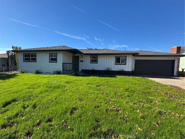 single story home with a front lawn and a garage