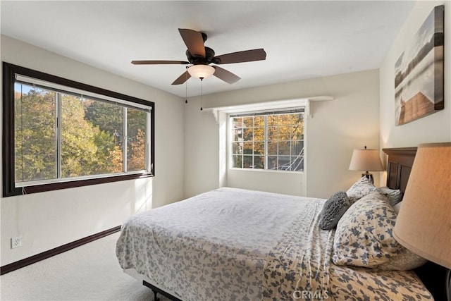 918 Sandalwood Dr, Lake Arrowhead, CA 92352 - carpeted bedroom featuring multiple windows and a ceiling fan