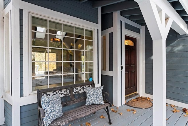 doorway to property featuring a porch