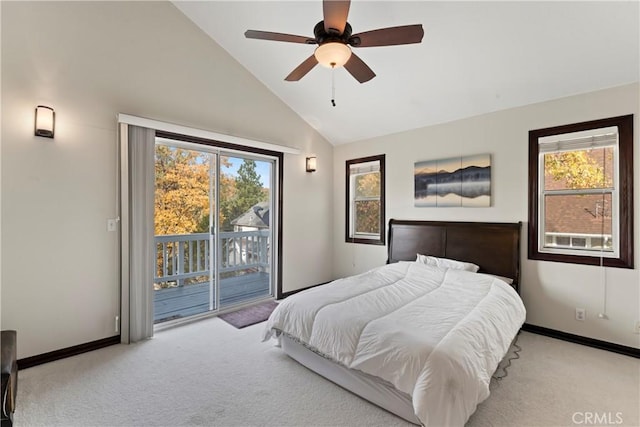 bedroom featuring ceiling fan, light carpet, access to outside, and multiple windows