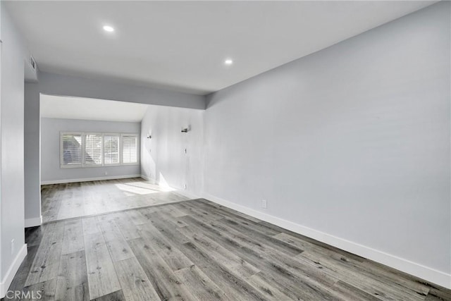 unfurnished room featuring light hardwood / wood-style flooring