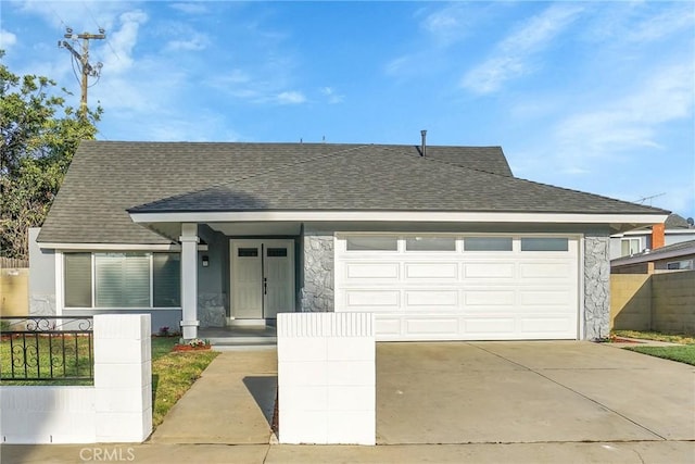 view of front of home with a garage