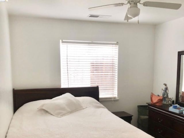 bedroom featuring ceiling fan