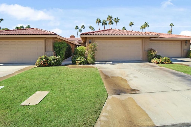 view of home's community featuring a lawn