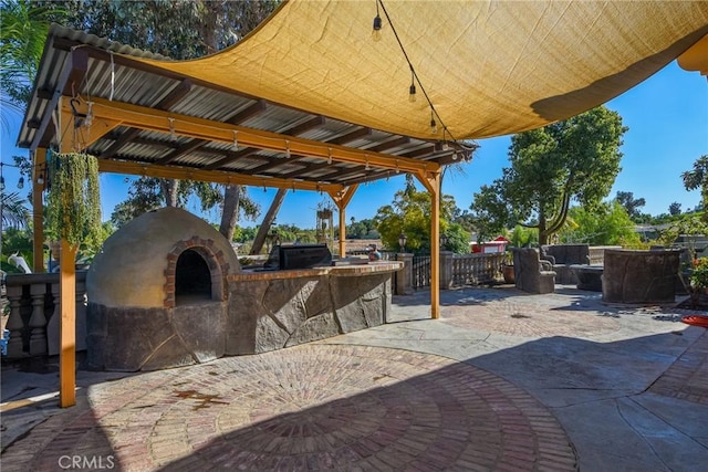 view of patio / terrace featuring an outdoor kitchen