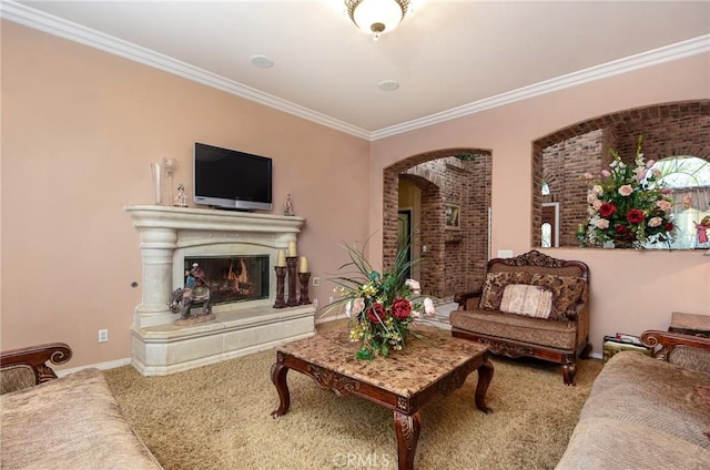 living room with carpet and ornamental molding