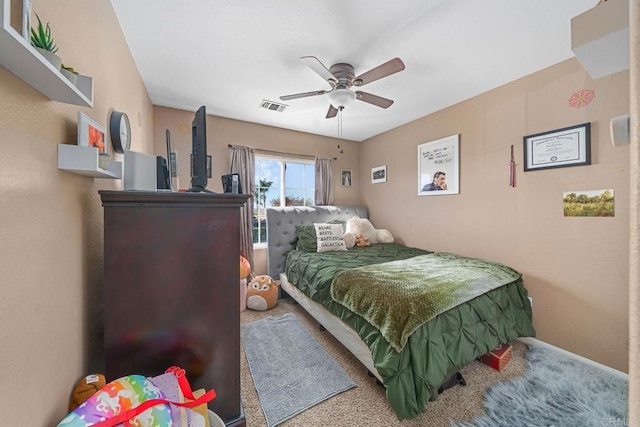 carpeted bedroom with ceiling fan