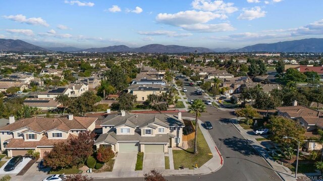 drone / aerial view featuring a mountain view