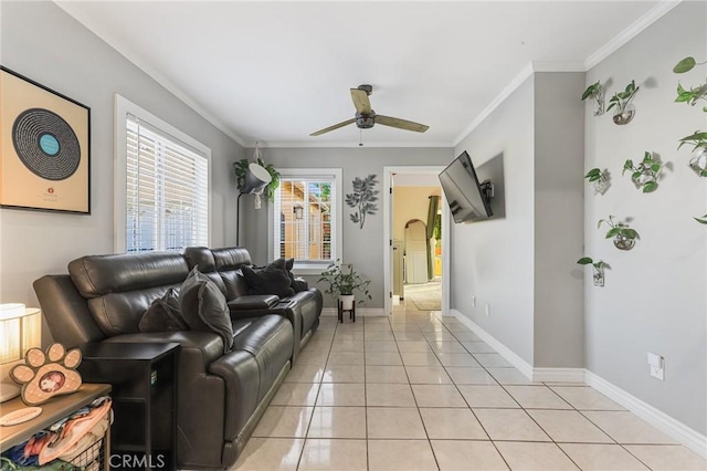 interior space featuring ornamental molding and ceiling fan