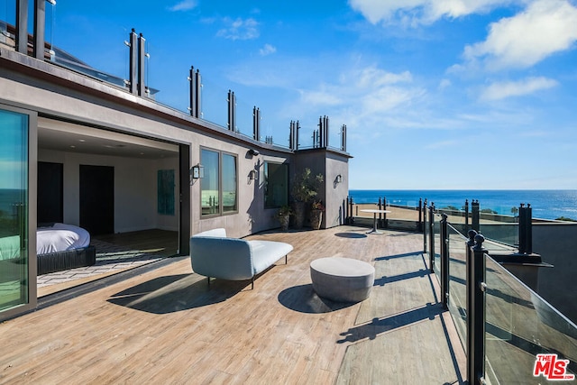 view of patio / terrace with a water view