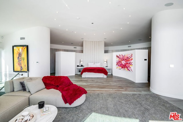 bedroom featuring hardwood / wood-style flooring